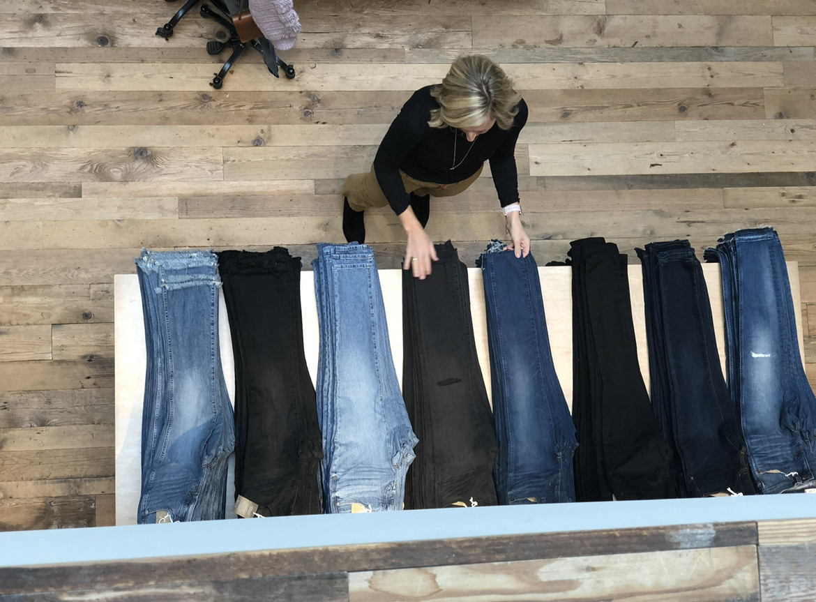 Wendy Pilch arranging denim from overhead