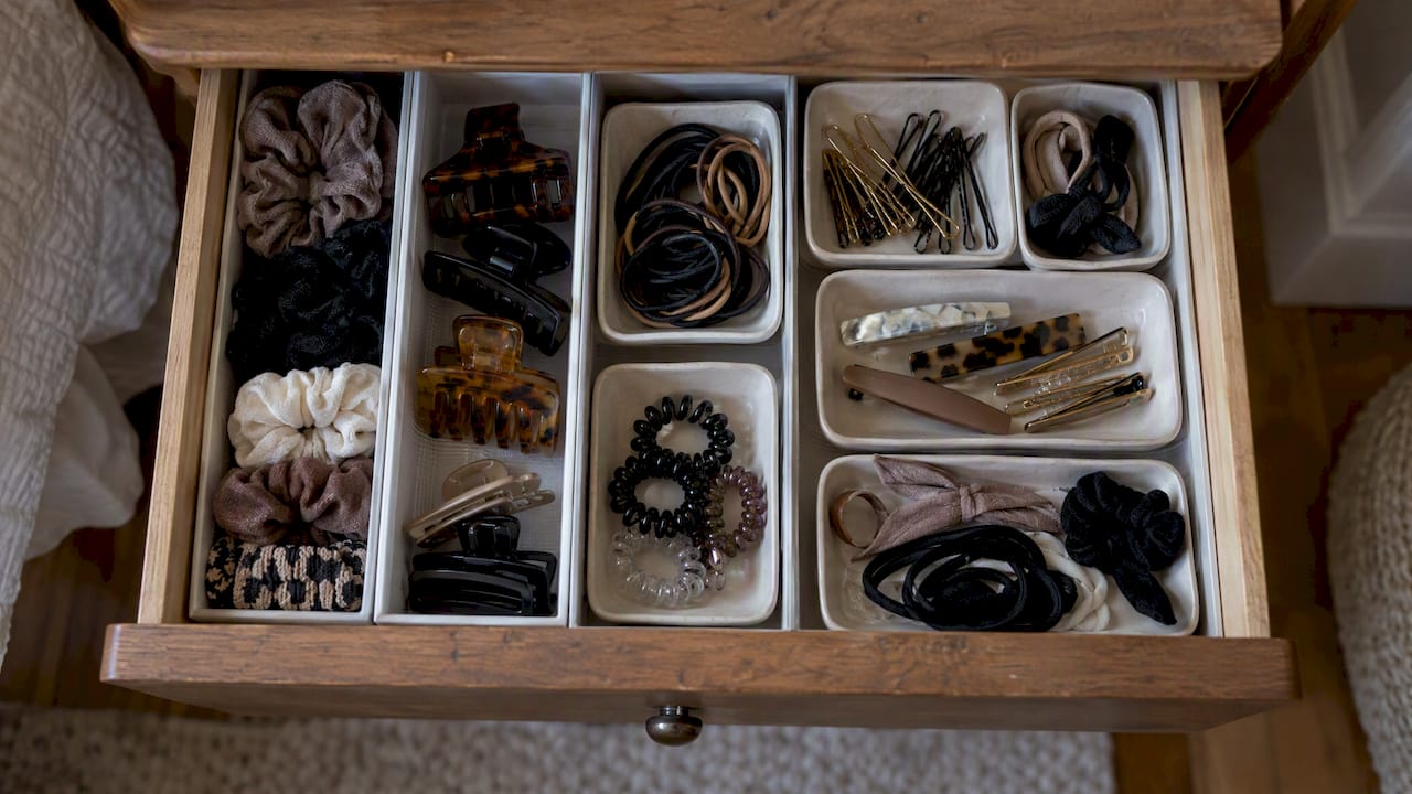 Hair accessories sorted in drawer dividers